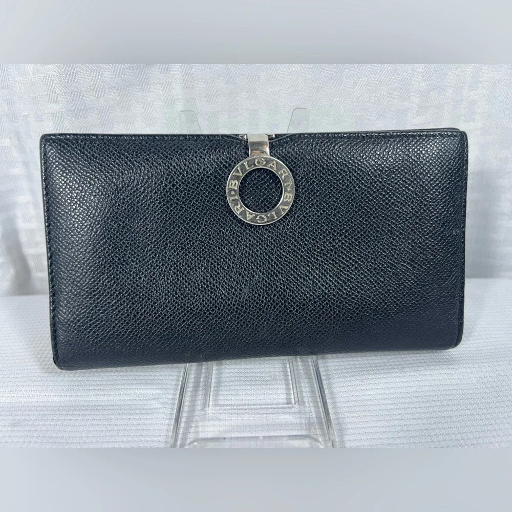 1050: Bvlgari Logo Ring Continental Wallet Black Grained Leather Blue